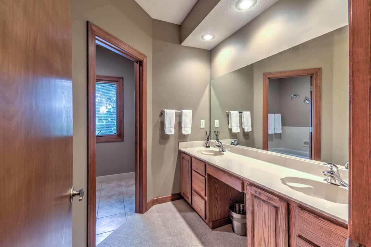 2269 South Houston Levee Road Collierville, TN 38139 - Photo 20 of 25 The shared bathroom is enhanced with an elongated double sink vanity with a make-up area.