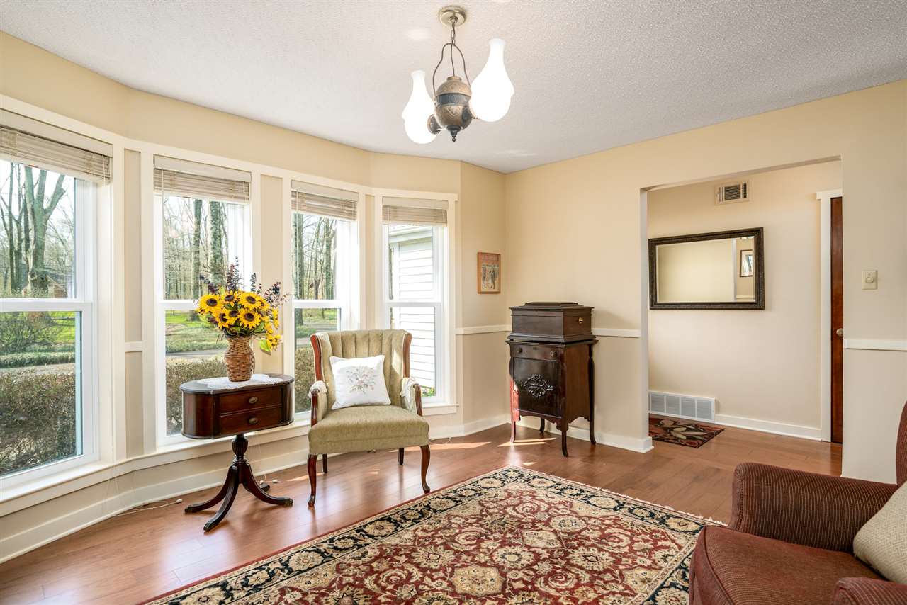6992 7th Road Bartlett, TN 38135 - Photo 7 of 25 Beautiful hardwood floors . Just imagine the dinner parties you can have in this dining room. DINING ROOM FIXTURES DOES NOT REMAIN WITH THE HOUSE. Seller will replace fixture.