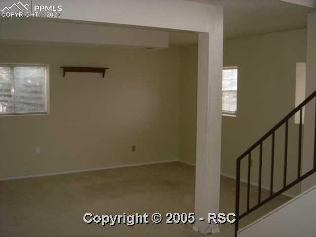 4412 Fenton Road Colorado Springs, CO 80916 - Photo 12 of 16 LOWER LEVEL FAMILY ROOM.