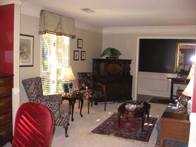 87 South Walnut Bend Road Memphis, TN 38018 - Photo 5 of 10 The formal living room (remember, you have a large comfortable den AND a formal living room!) Wonderful crown molding again. There are little custom touches in this home that you are not going to see at any other home in this price range!