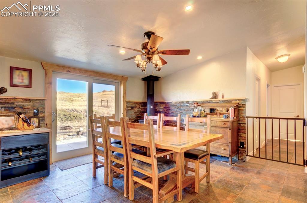 3235 South Meridian Road Colorado Springs, CO 80929 - Photo 11 of 36 Kitchen with Wood Burning Stove!