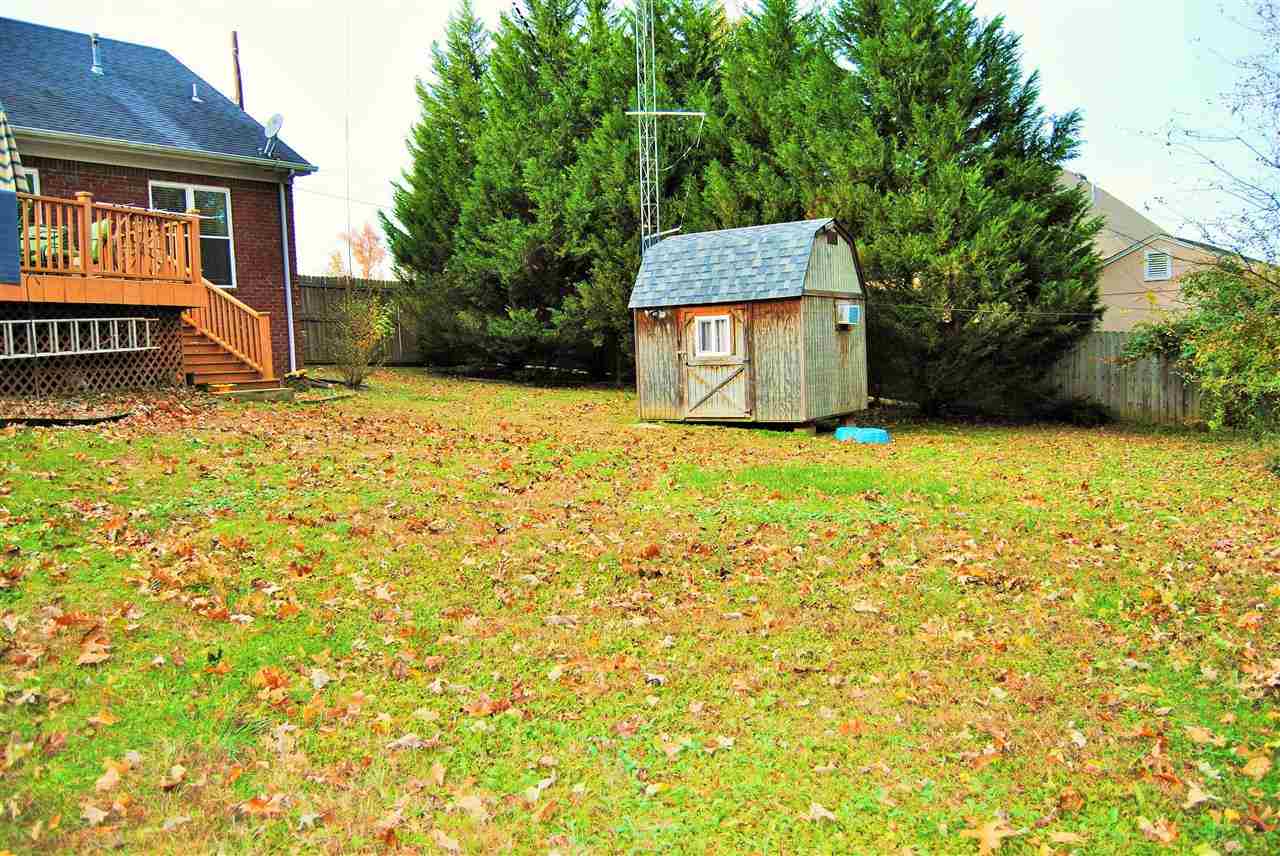335 Ridgeway Lane Millington, TN 38053 - Photo 21 of 24 View of Backyard. Shed 2 is equipped with Elec. Great Little Hobby Shed or Man Cave.