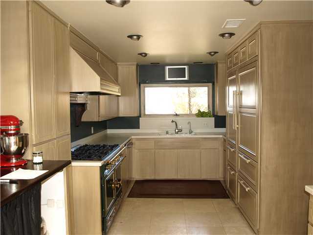 1378 Crest Drive Encinitas, CA 92024 - Photo 11 of 16 Kitchen has Sub Zero refrigerator with 2 freezer drawers and 2 refrigerator drawers, a La Cornue range, and double oven.