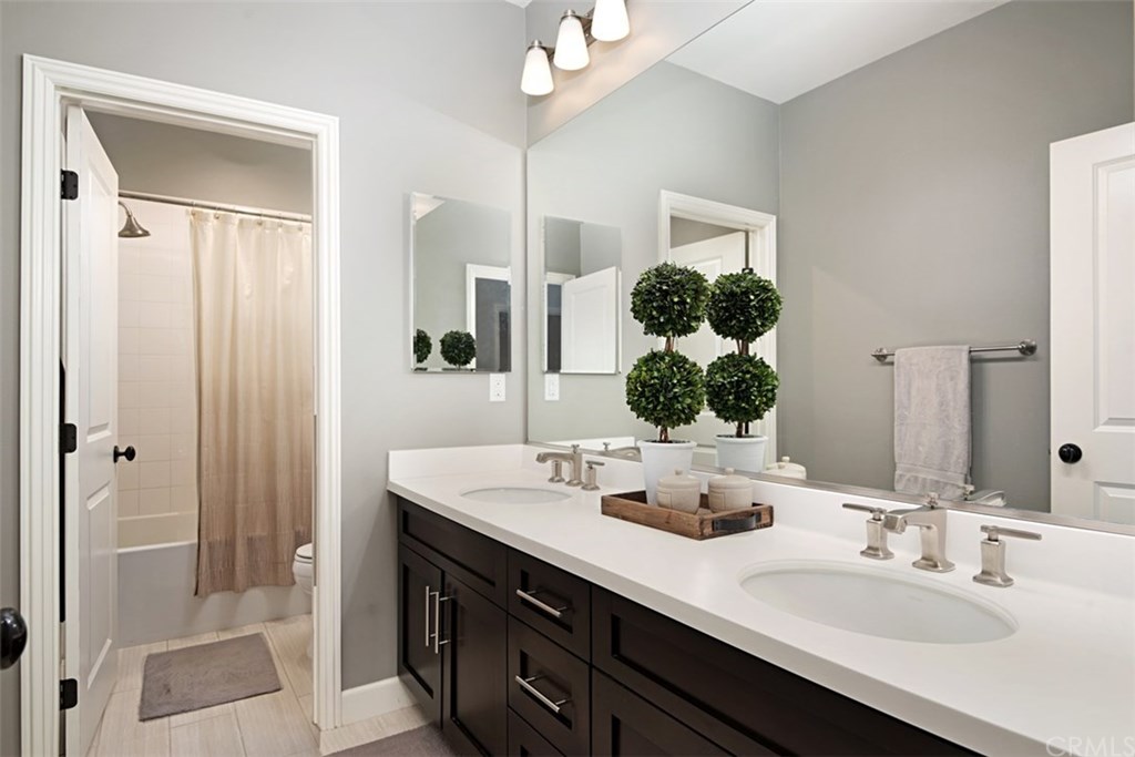 53 Livia Irvine, CA 92618 - Photo 35 of 67 Bathroom has dual sinks and is shared between Bedrooms #3 and #4