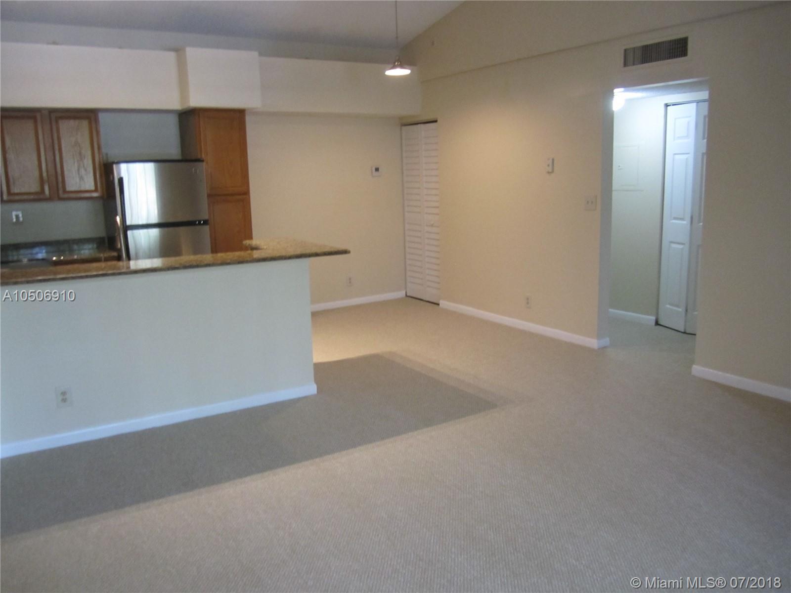 831 Lyons Road, Unit 23205 Coconut Creek, FL 33063 - Photo 1 of 21