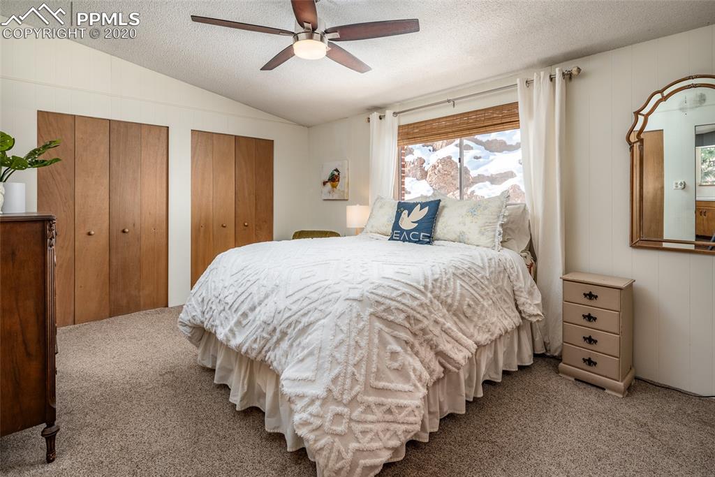 8715 Chipita Park Road Cascade, CO 80809 - Photo 21 of 33 Master bedroom, closets and en-suite bathroom.