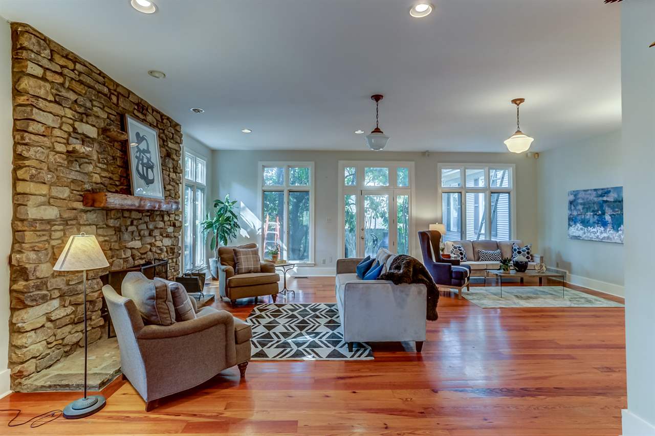 302 South Collierville Arlington Road Collierville, TN 38017 - Photo 6 of 24 With stone fireplace and loads of light!