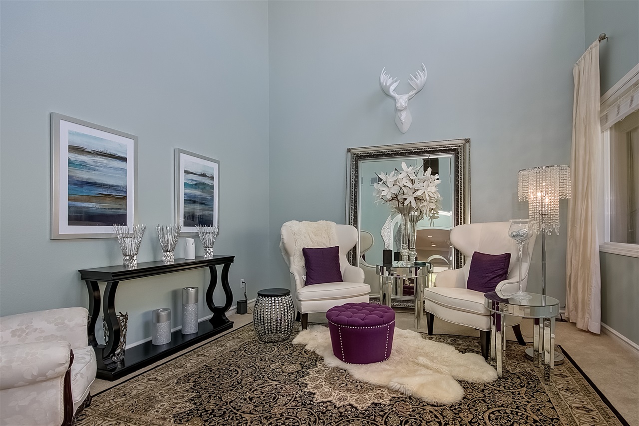 1853 Shadetree Drive San Marcos, CA 92078 - Photo 4 of 25 Living room has arch way with very tall ceilings, light/bright and beautiful.