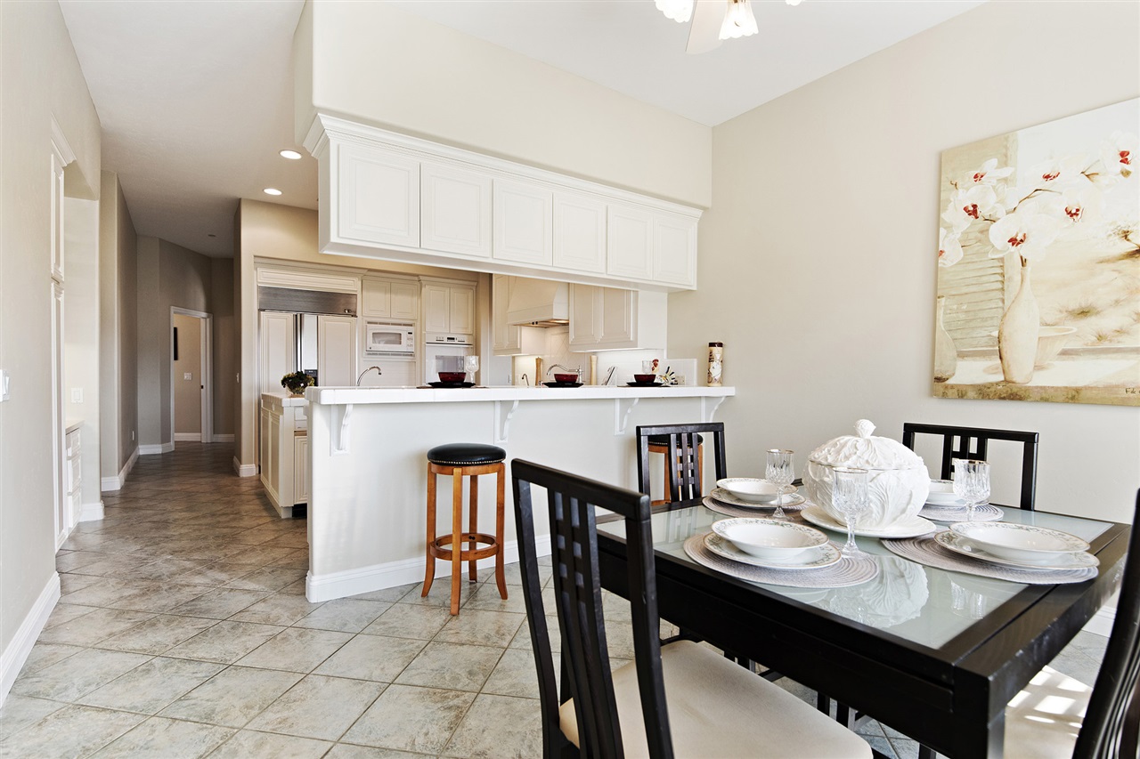 2206 Dos Lomas Fallbrook, CA 92028 - Photo 21 of 25 This large, bright and airy breakfast nook is freshly painted and has window shutters
