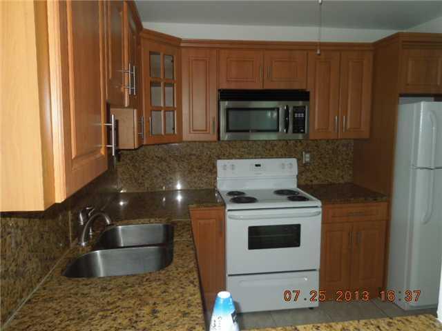 700 Northwest 214th Street, Unit 101 Miami, FL 33169 - Photo 8 of 12