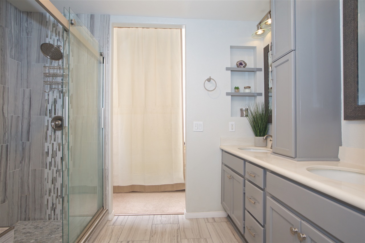 1270 Riviera Summit Road San Diego, CA 92154 - Photo 19 of 25 Connected master bathroom with designer finishes, bench seat in shower, dual vanities, and huge walk in closet.