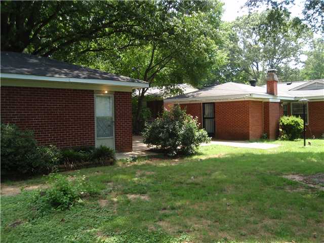1479 Wilbec Road Memphis, TN 38117 - Photo 6 of 25 The wonderful, brick two car garage is to the left and the house straight ahead. So many options for you in this backyard!