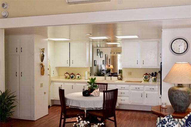 13881 Thunderbird Drive, Unit 64K Seal Beach, CA 90740 - Photo 7 of 21 Full kitchen view with potential dining area.