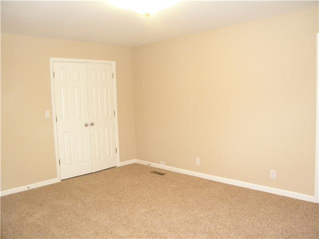 1570 Porter Road Burns, TN 37029 - Photo 21 of 30 Flex Room off the master bedroom. This could be an office/den/exercise room. There is a large closet, two phone jacks, cable, new carpet.