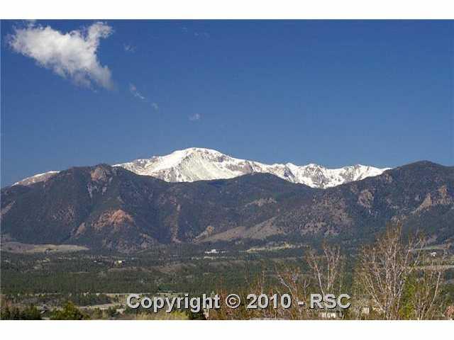 235 Desert Inn Way Colorado Springs, CO 80921 - Photo 16 of 16 Pikes Peak, 14,115 feet of solid granite dominate the scene around our beautiful city. It is an easy commute south to downtown Colorado Springs or north to the Denver Tech Center.