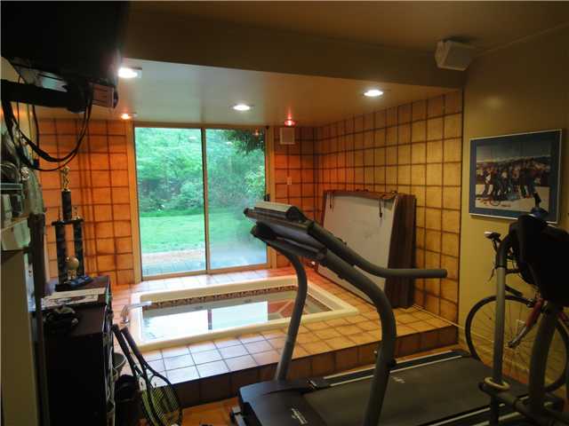 5345 Lexington Road Memphis, TN 38120 - Photo 23 of 23 A full bath and this gym are accessible from the room just seen. Beside the hot tub & tiled space for equipment, there is steam shower behind the camera. In reality, the big window makes this place light,bright and cheery.