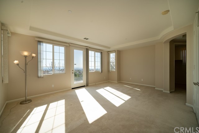 5473 Stoneview Road Rancho Cucamonga, CA 91739 - Photo 31 of 56 Master bedroom with balcony and beautiful city lights view