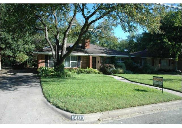 6803 Blessing Drive Dallas, TX 75214 - Photo 1 of 1 Mature trees, huge lot, flowing creek, solar powered security gate, parking for three... This home has it all!
