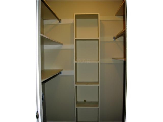7103 Belsfield Road Memphis, TN 38119 - Photo 17 of 25 Walk-in closet in Bedroom #2 has built-in shelving
