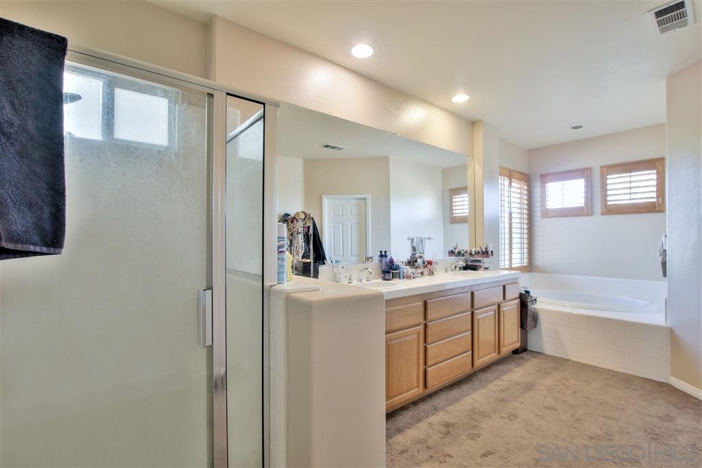 17250 Scottsdale Road Riverside, CA 92504 - Photo 19 of 25 Features Dual Vanities, Separate shower and jacuzzi tub