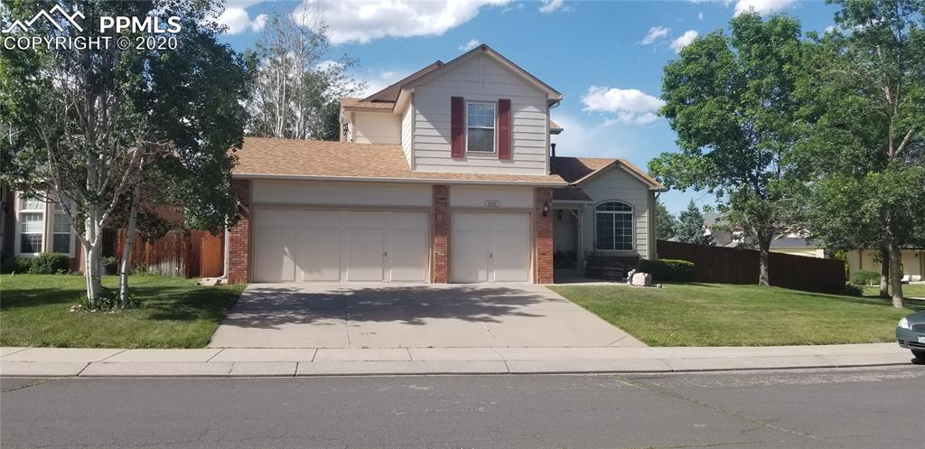 6565 Quarter Circle Road Colorado Springs, CO 80922 - Photo 1 of 21 Front of house