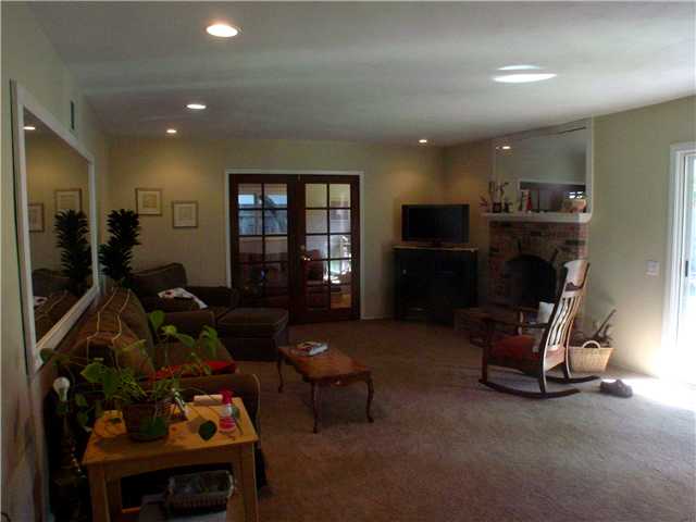 12721 Rios Road San Diego, CA 92128 - Photo 5 of 14 Living Room -- behind the French Doors straight ahead is an extra room not included in the square footage.
