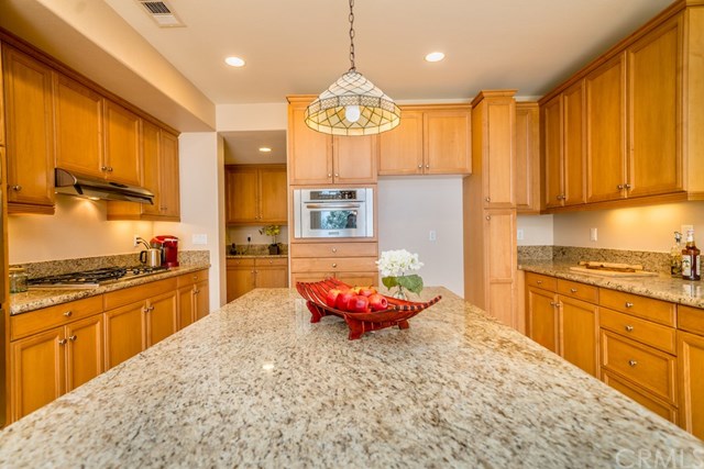 5473 Stoneview Road Rancho Cucamonga, CA 91739 - Photo 12 of 56 Large kitchen island with granite countertop