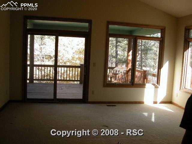 1120 Timber Valley Road Colorado Springs, CO 80919 - Photo 7 of 16 Masster bedroom with walk-out