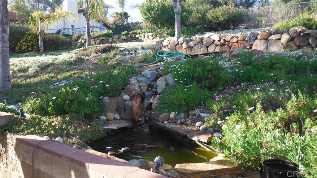 23916 Gymkhana Road Ramona, CA 92065 - Photo 6 of 6 Room for garden with waterfall and fish pond off California room (screened in patio)
