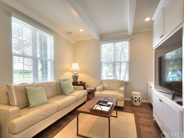 124 White Flower Irvine, CA 92603 - Photo 3 of 26 The Living Room is light and bright with a built-in entertainment center