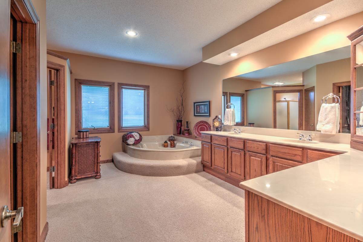 2269 South Houston Levee Road Collierville, TN 38139 - Photo 17 of 25 The spa-inspired master bathroom comes complete with a relaxing whirlpool tub, divine walk-in shower, linen closet, and an elongated double sink vanity with a separate make-up area.