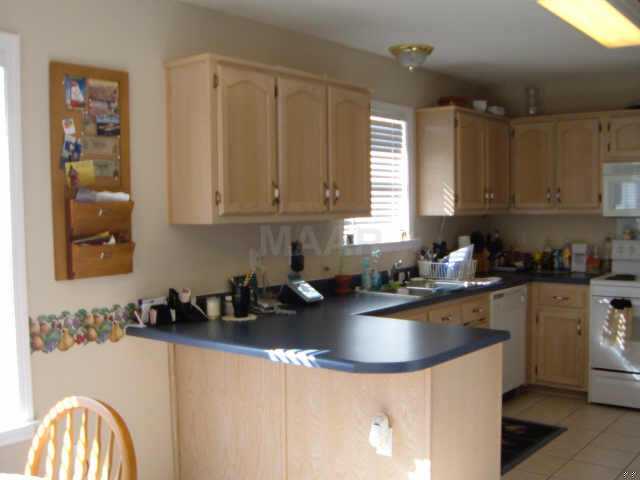 TITLE FLOORS IN KITCHEN &amp; BATHS