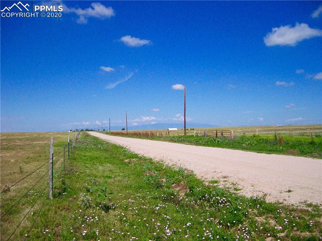 32195 North Neely Road Yoder, CO 80864 - Photo 3 of 3 Electric at the road. Property is fenced along Neely Road. Notice your view of Pikes Peak and the front range.