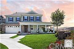 2 Taffeta Lane Ladera Ranch, CA 92694 - Photo 1 of 1 Inviting curb appeal complete with a wrap-around front porch!