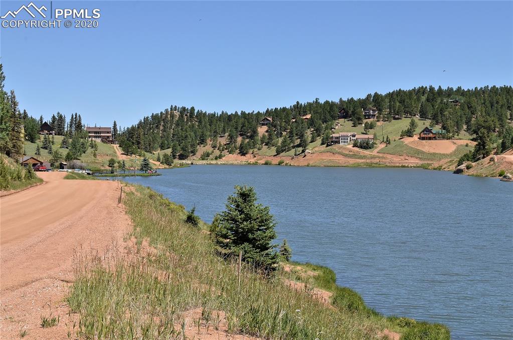 87 Apache Trail Divide, CO 80814 - Photo 13 of 20 Looking north from the western shore of Burgess Reservoir along Spring Valley Drive.