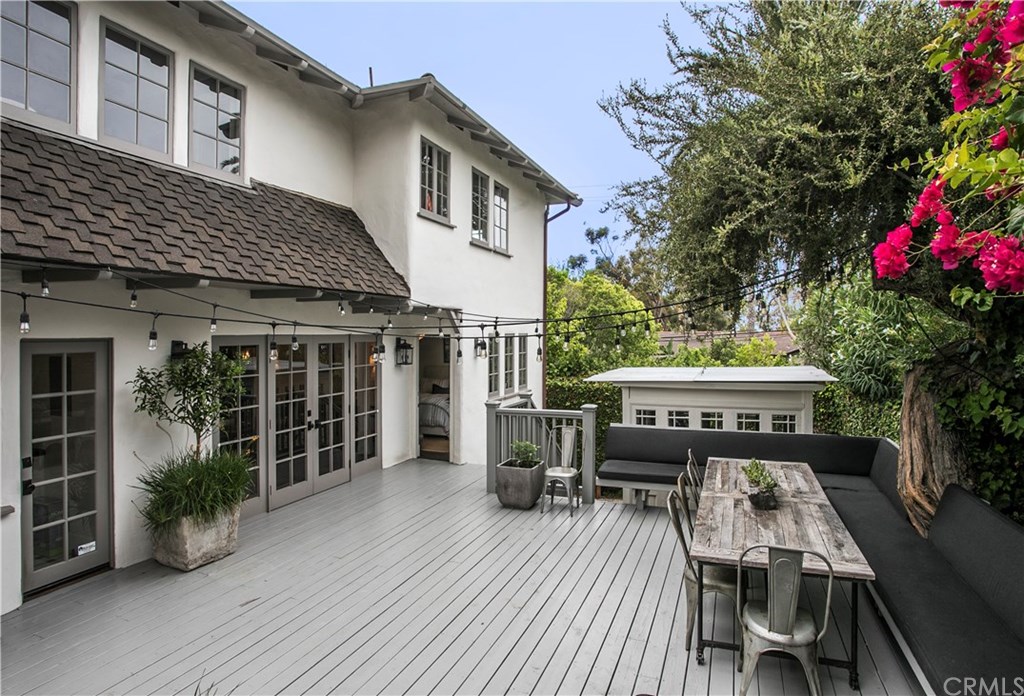 326 Ruby Street Laguna Beach, CA 92651 - Photo 19 of 20 Back Yard Deck with Built-in Bench Seating, Custom Cushions, and Separate Room for Gym, Storage, etc.