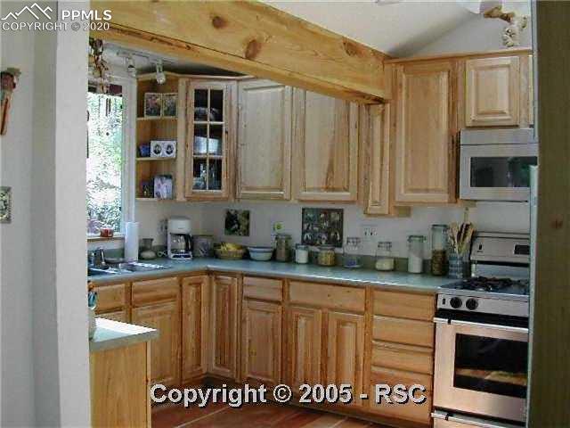 9150 Picabo Road Cascade, CO 80809 - Photo 2 of 7 Remodeled kit w/vaulted ceilings & stainless steel appliances