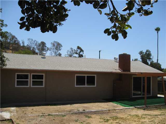 12516 Taunt Road Poway, CA 92064 - Photo 12 of 17 REAR SHOT OF HOME WITH FIREPLACE......IT IS A REAL FIREPLACE....A REAL FIREPLACE