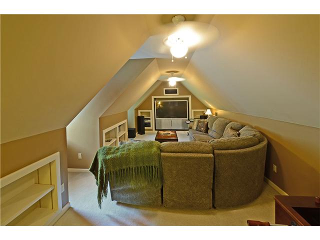 196 Wiseman Road Eads, TN 38028 - Photo 17 of 22 bonus room 2 or media room like it is currently set up. This is a great place for the adults or for the kids to play. Notice there are multiple built in bookcases along the side wall and back.