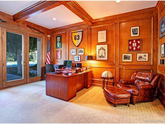 17036 Circa Del Sur Rancho Santa Fe, CA 92067 - Photo 7 of 25 Located just off the entry and near the master bedroom, this richly paneled office contains French doors leading to a patio and contains a full bath with a door leading out to the pool area.
