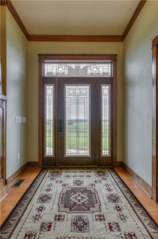 13920 Patterson Road College Grove, TN 37046 - Photo 8 of 30 We better check out the house! Step inside the spacious foyer.Notice the lead glass door and sidelights.