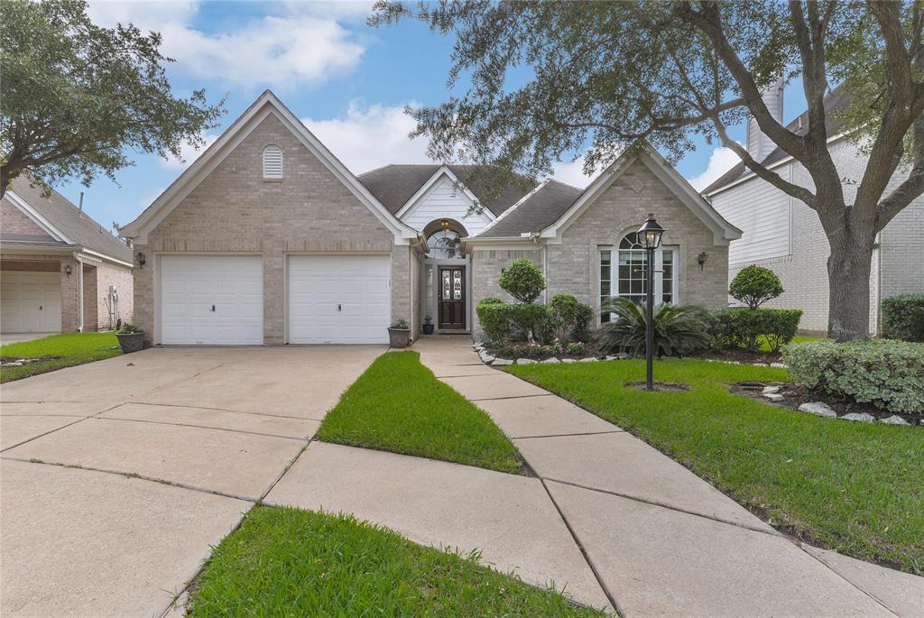 Gorgeous 4 bedroom home with lakefront views located in the gated community of Shadowlake.