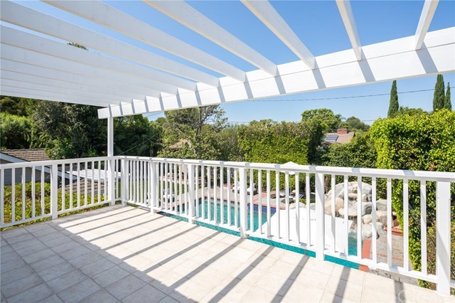 1437 La Perla Avenue Long Beach, CA 90815 - Photo 27 of 43 Upstairs balcony overlooking backyard views.