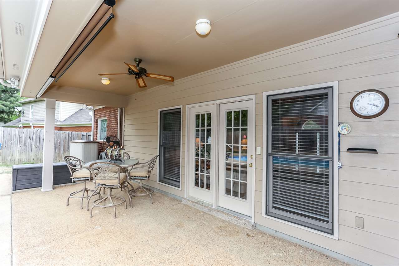 458 Duscoe Street Collierville, TN 38017 - Photo 25 of 25 Enjoy family cookouts in this fabulous backyard with this covered porch that overlooks the incredibly lovely pool! Plenty of room for tables, chairs, lounge chairs, etc! The two storage bins are also included in the sale!