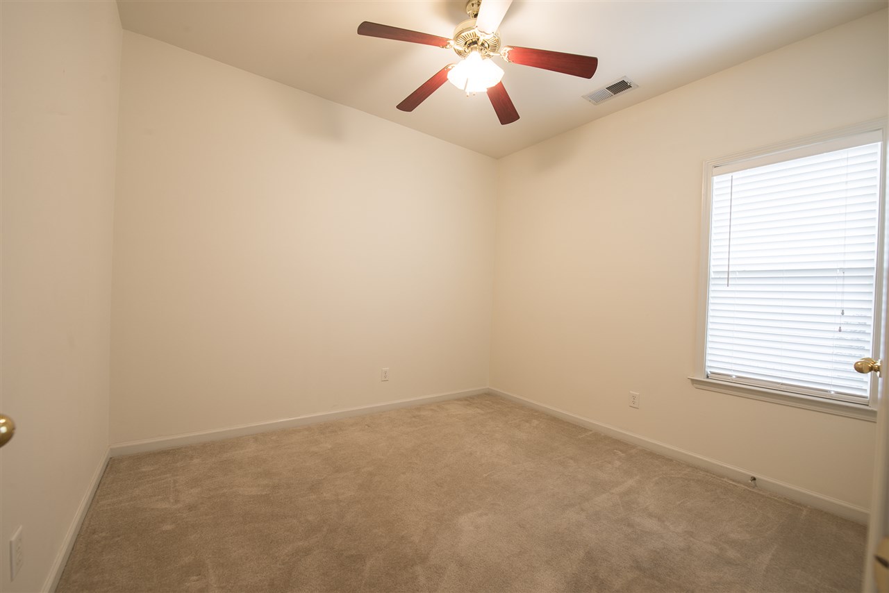 1237 Misty Isle Drive Memphis, TN 38103 - Photo 11 of 22 2nd bedroom is the larger of the 2nd & 3rd bedrooms and has a large closet and is located off a hallway by the kitchen.