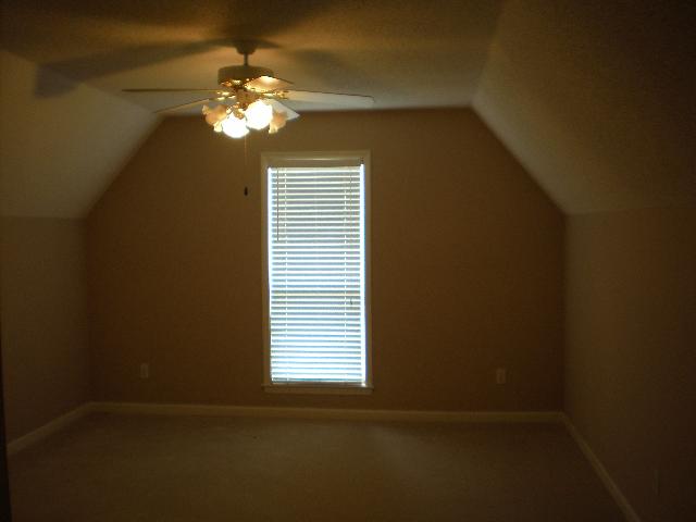 9071 Crumpler Road Olive Branch, MS 38654 - Photo 8 of 9 GAMEROOM OR BEDROOM UPSTAIRS WITH PRIVATE BATH.