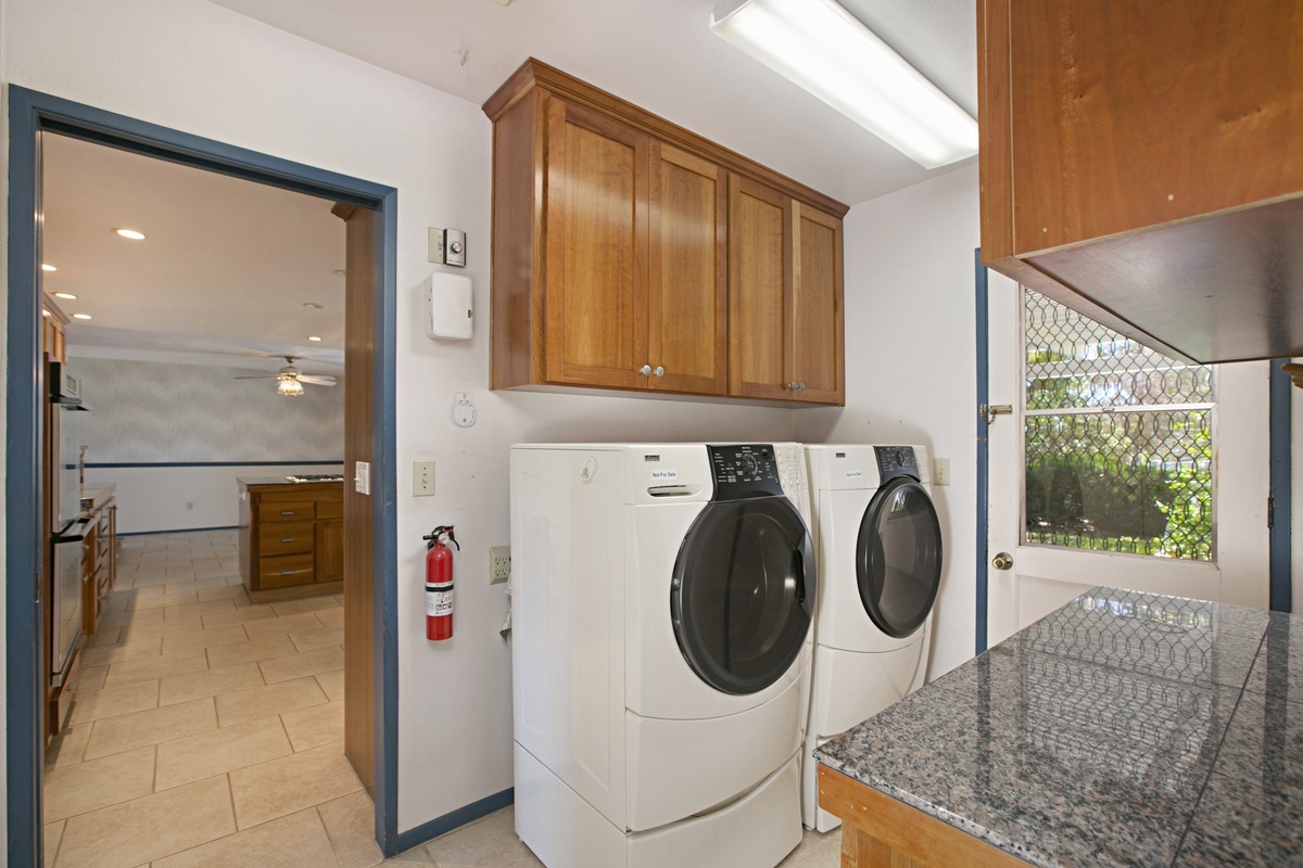 30968 Cole Grade Road Valley Center, CA 92082 - Photo 9 of 25 Indoor Laundry Room with an abundance of Cabinets & Storage AND direct access to the rear Patio!