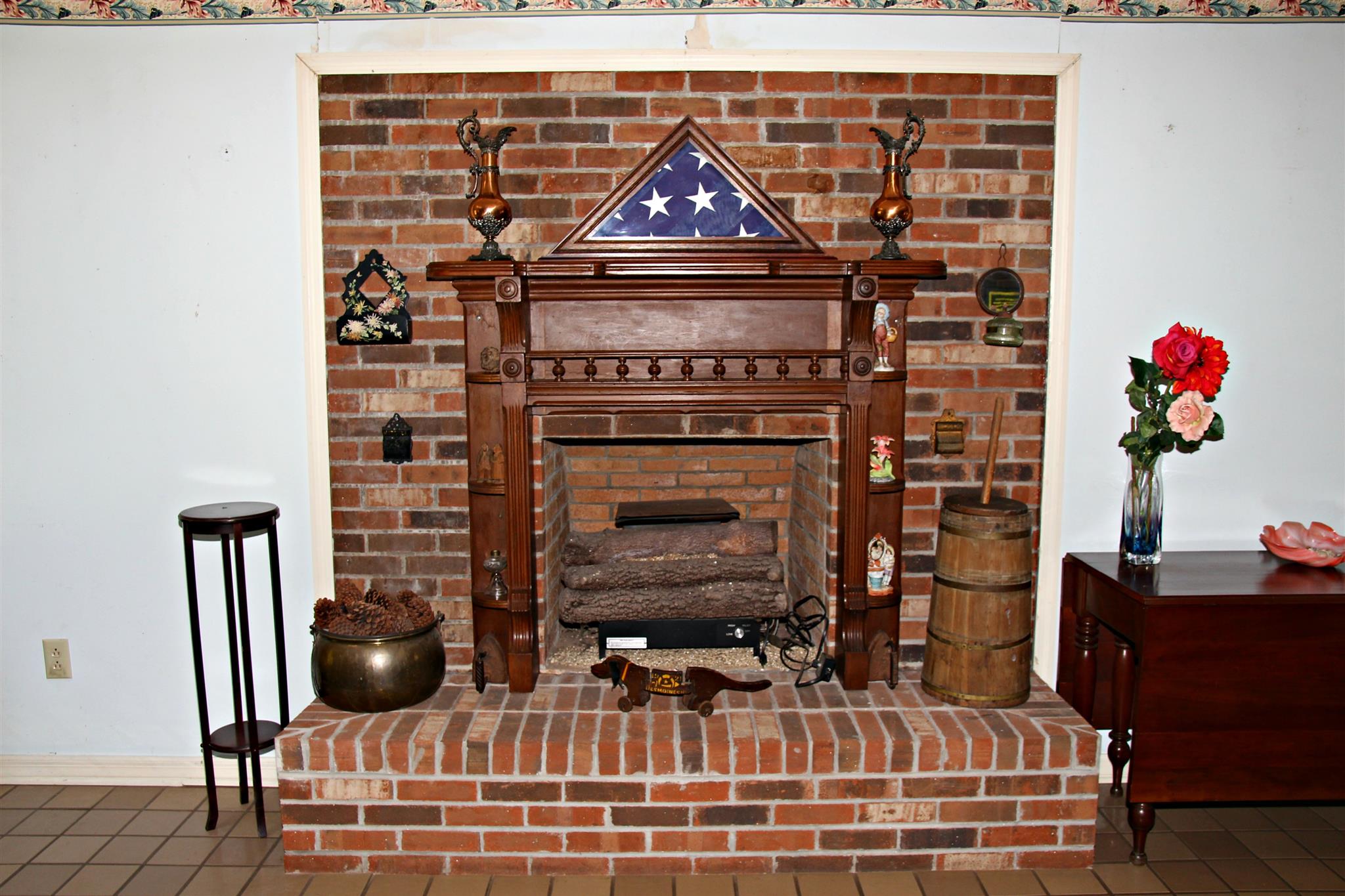 300 Kippsford Pond Road Columbia, TN 38401 - Photo 17 of 36 Fireplace in den area with brick hearth.