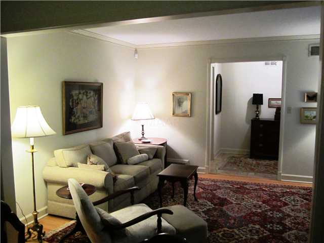 741 South Yates Road Memphis, TN 38120 - Photo 3 of 12 Partial view of gracious-sized Living Room with hardwood floors and large bay windows!