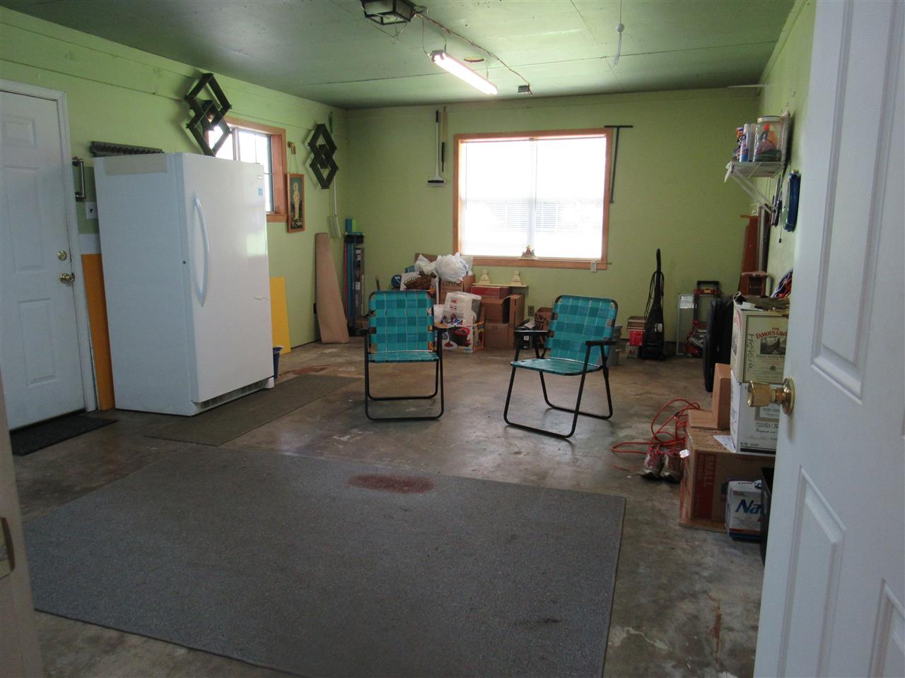 962 Reed Circle Drummonds, TN 38023 - Photo 17 of 25 This room is an enclosed garage, it does not have heat/air but that's an easy fix. With Carpeting and a closet, it could easily serve as another bedroom or den, playroom, game room...you decide!